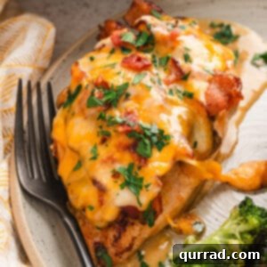 Alice Springs chicken on a plate with a fork