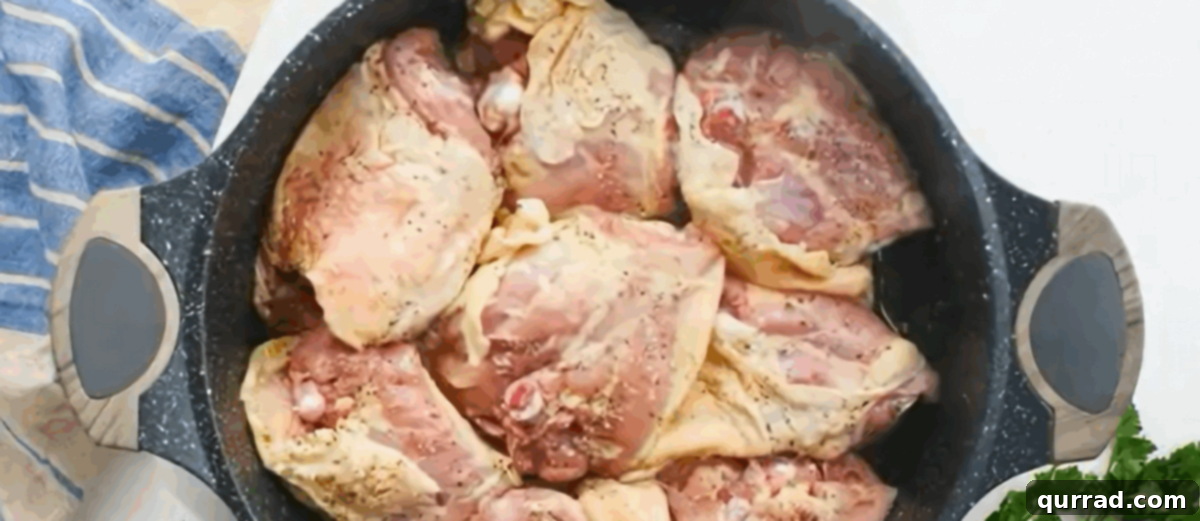 Rich Hungarian Paprika Chicken 3 Browning the chicken skin in a black skillet until golden and crisp.