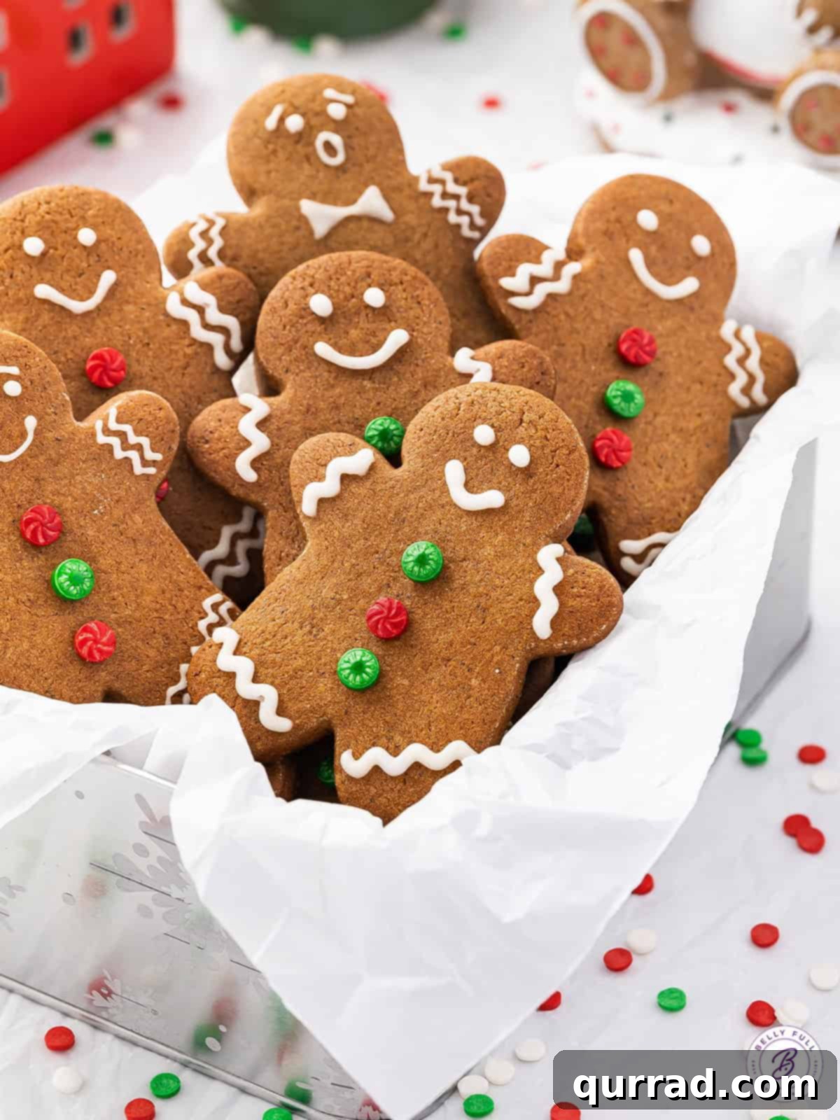 A basket filled with golden-brown gingerbread man cookies, some with simple white icing decorations. Perfect for holiday baking.