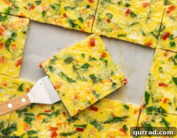One Pan Frittata 5 Serving a slice of sheet pan frittata