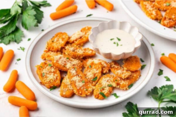 Plate of Smashed Carrots with dipping sauce, ready to serve