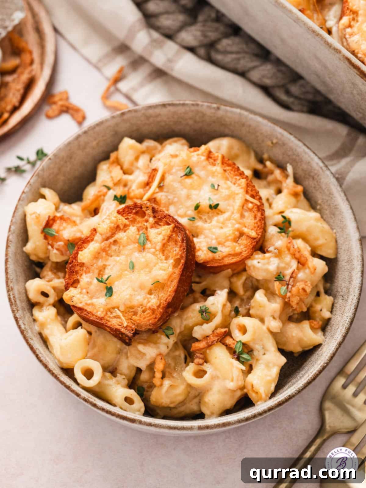 French Onion Macaroni Gratin 4 A bowl of French onion mac and cheese.