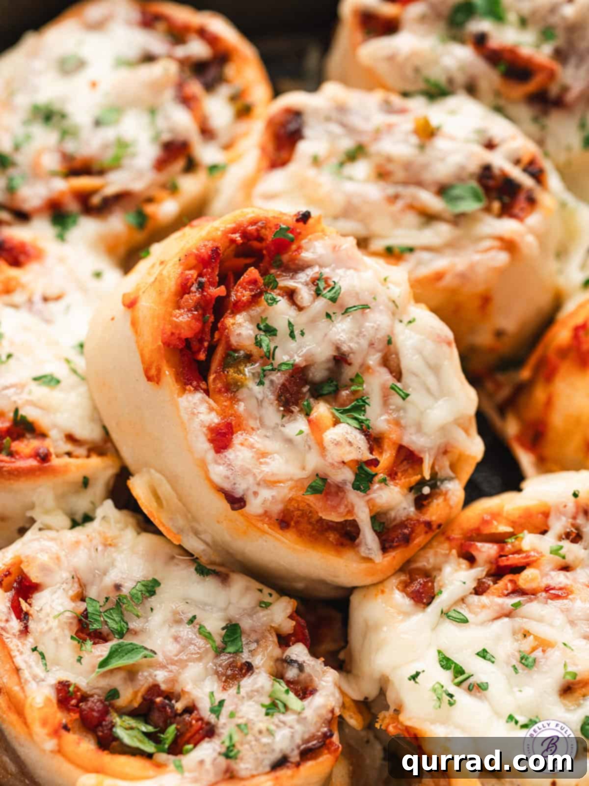 Easy Cheesy Supreme Pizza Rolls: A perfect appetizer loaded with flavor. Close up of cheesy supreme pizza rolls, showcasing melted cheese and toppings.