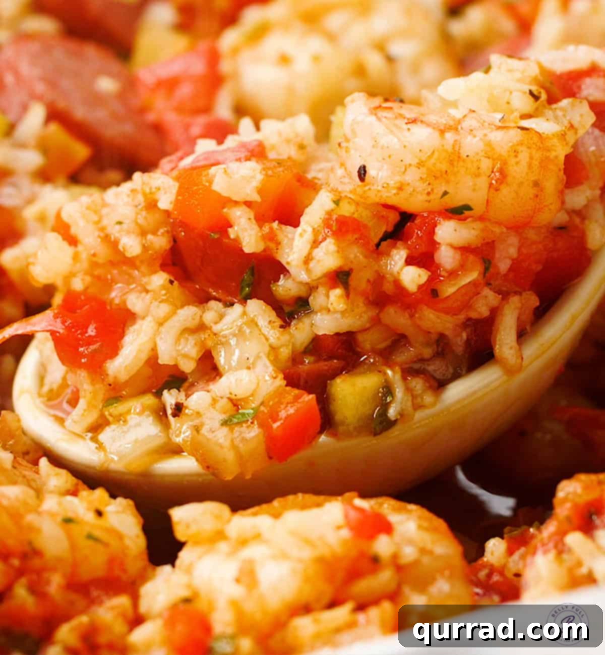 Hearty Jambalaya Bake 3 Spoonful of hearty Jambalaya Casserole ready to be served