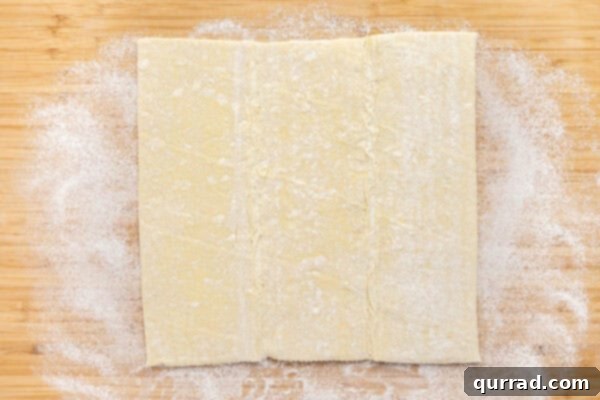 Puff Pastry Jam Spirals 2 A puff pastry sheet on a floured surface