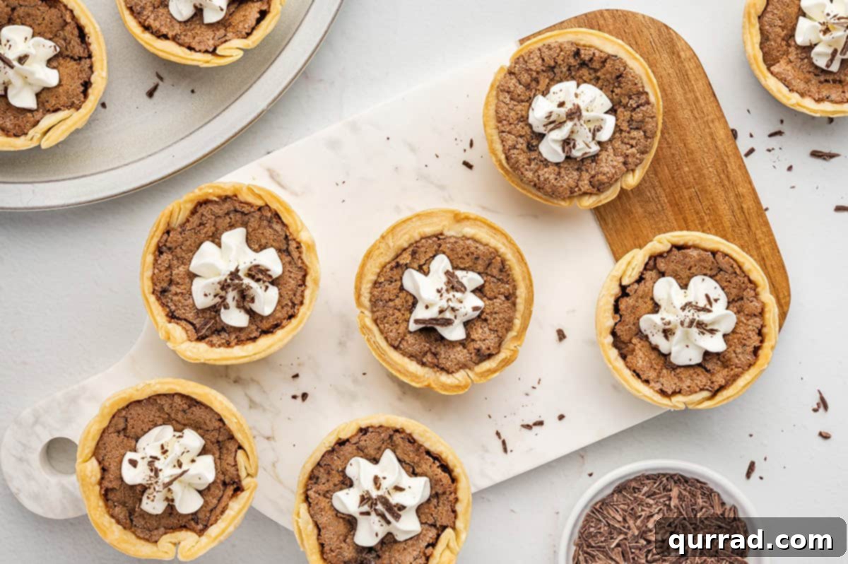 Pint-Sized Chocolate Bliss 9 overhead mini chocolate pies with whipped cream on serving board
