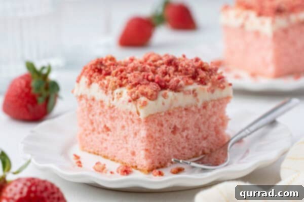 Strawberry Crunch Delight 8 A slice of strawberry crunch cake on a plate