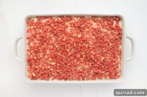Strawberry Crunch Delight 7 Overhead view of a pan of strawberry crunch cake