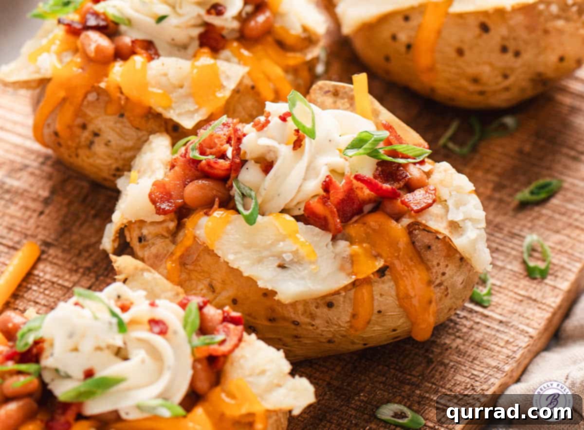 Loaded Baked Potato Delights 11 Stuffed jacket potatoes filled with whipped cream cheese, bacon, shredded cheddar, and scallions.