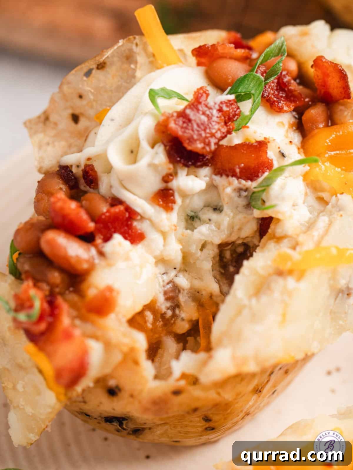 Loaded Baked Potato Delights 12 A overhead close up of stuffed jacket potatoes.