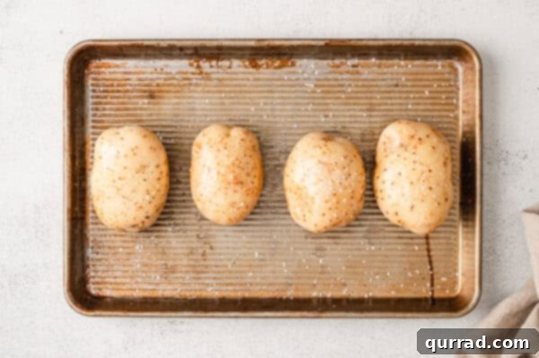 Loaded Baked Potato Delights 5 Potatoes rubbed in oil and salt before baking.