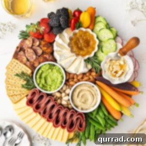Overhead view of a beautiful spring charcuterie board with all ingredients arranged