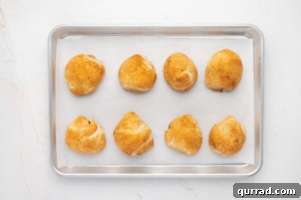 Baked resurrection rolls on a baking sheet