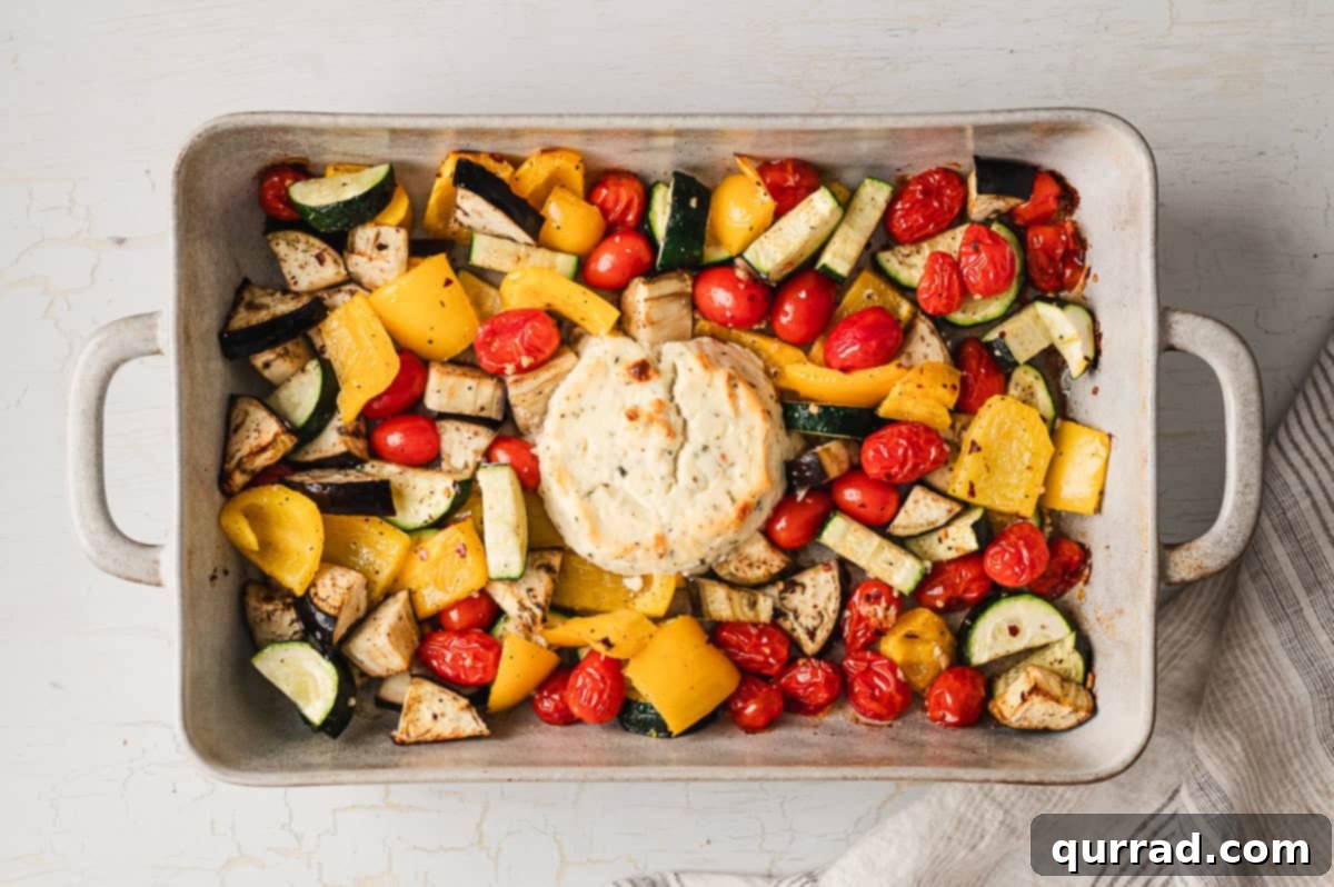 Velvety Ratatouille Pasta 6 Baked vegetables and melted Boursin cheese in a baking dish, fresh out of the oven.