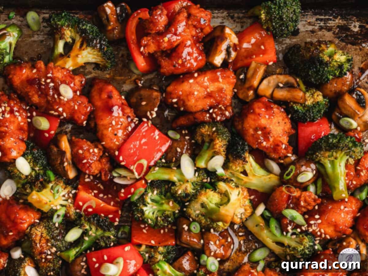 Crispy Oven Baked General Tso Chicken 7 Overhead view of sheet pan General Tso's chicken plated
