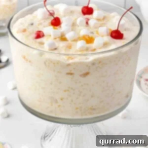 A dessert bowl of frog eye salad, ready for serving.