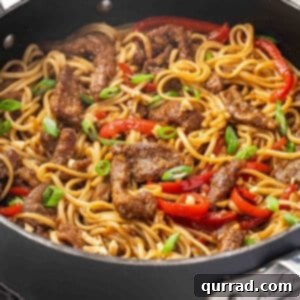 A skillet of Mongolian beef noodles