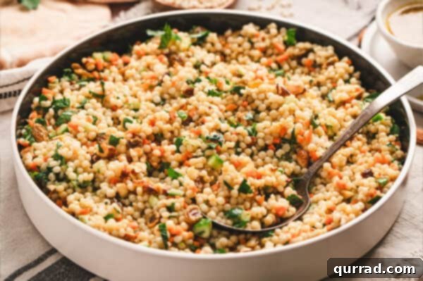 A bowl of curried couscous salad
