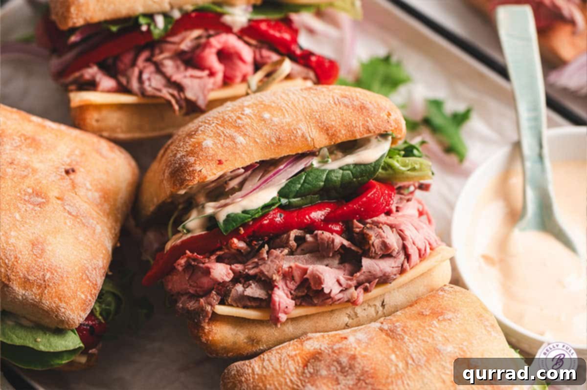 Gourmet El Matador Sandwiches ready to be enjoyed. An overhead shot showcasing two perfectly arranged El Matador sandwiches, highlighting their vibrant layers and inviting presentation.