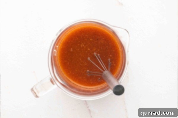 Bloody Mary Flavor Cubes 3 Overview of Bloody Mary ingredients in a measuring cup