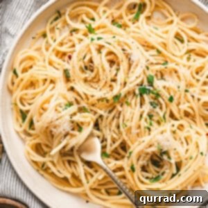 Overhead view of a plate of spaghetti aglio e olio