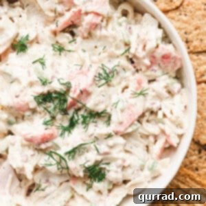 A close-up of the crab salad in a serving bowl, highlighting its creamy texture.