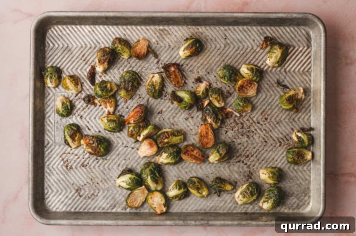 Balsamic Glazed Brussels Sprouts with Crispy Bacon 6 Roasted Brussels sprouts with dark golden edges.