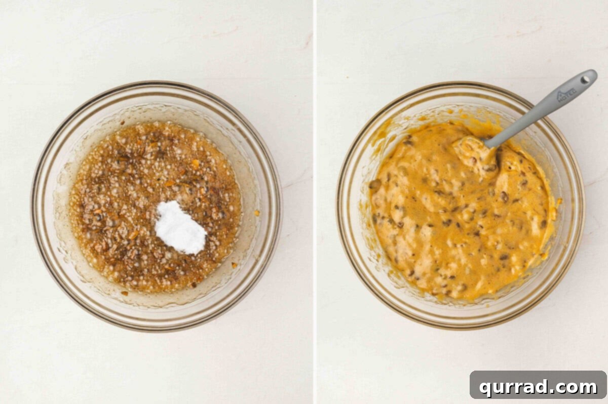 Brittle mixture bubbling in the bowl with baking soda added, then stirred into a light, foamy texture.