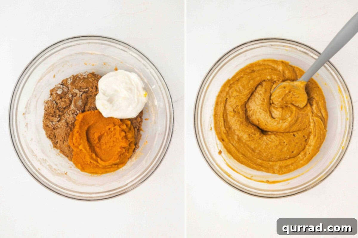 Pumpkin puree and sour cream being added to the batter, then carefully folded in until the mixture is smooth and evenly combined, maintaining a light consistency.