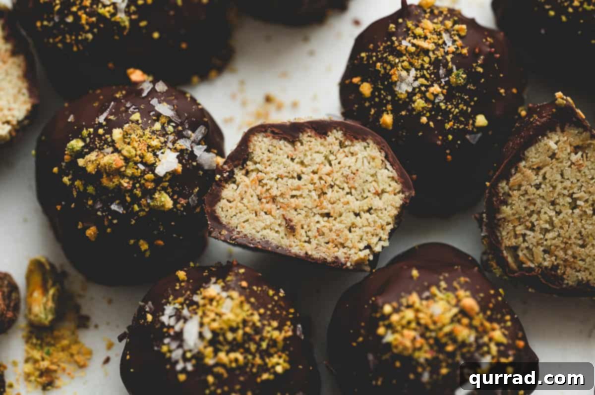 Decadent Dubai Truffles 12 Close-up of Dubai chocolate truffles showing the crisp kataifi pistachio filling inside.