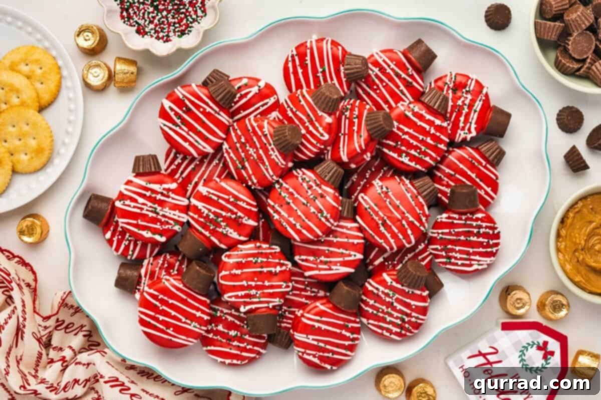Ritz Cracker Holiday Charms 9 Large platter filled with red chocolate-covered Ritz cracker ornament cookies topped with Rolos and holiday sprinkles.
