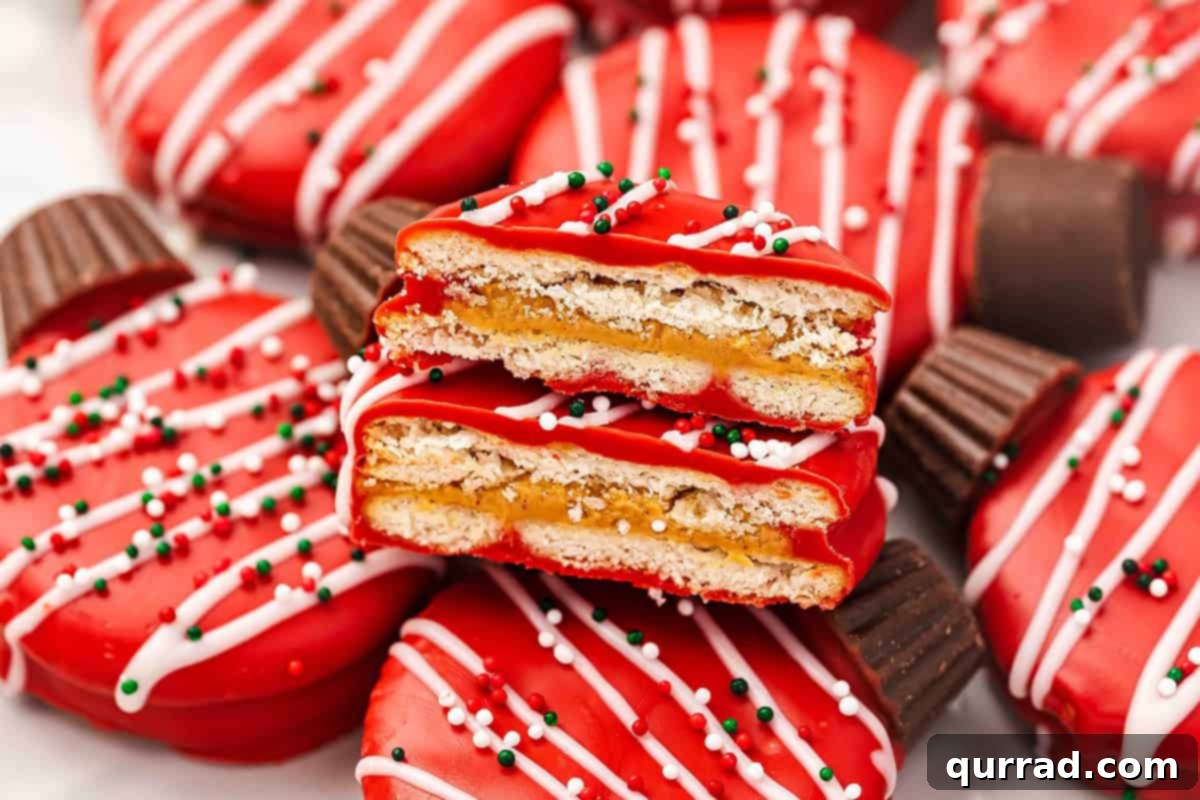 Ritz Cracker Holiday Charms 10 Cross-section of a chocolate-covered Ritz ornament cookie showing the peanut butter filling between two crackers.
