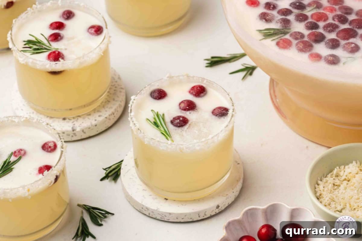 Icy Holiday Bliss 9 Glasses of White Christmas Punch with Coconut Rim