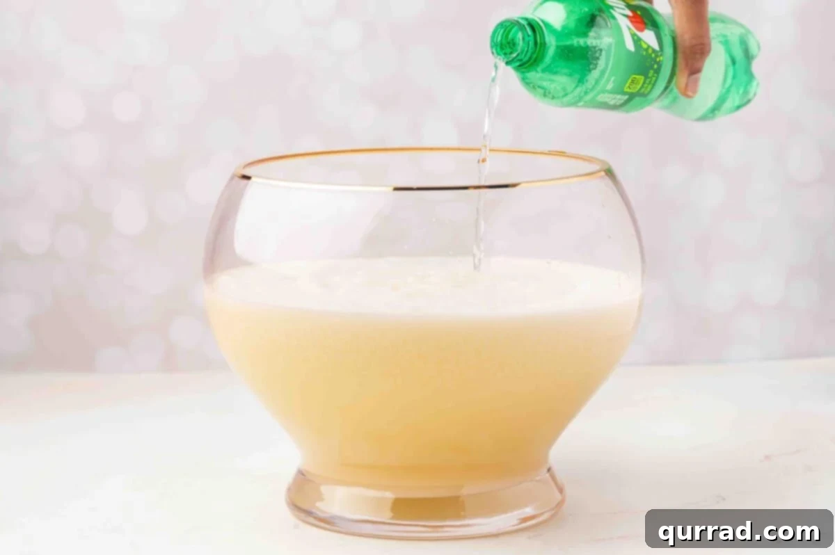 Icy Holiday Bliss 6 Adding 7UP to White Christmas Punch