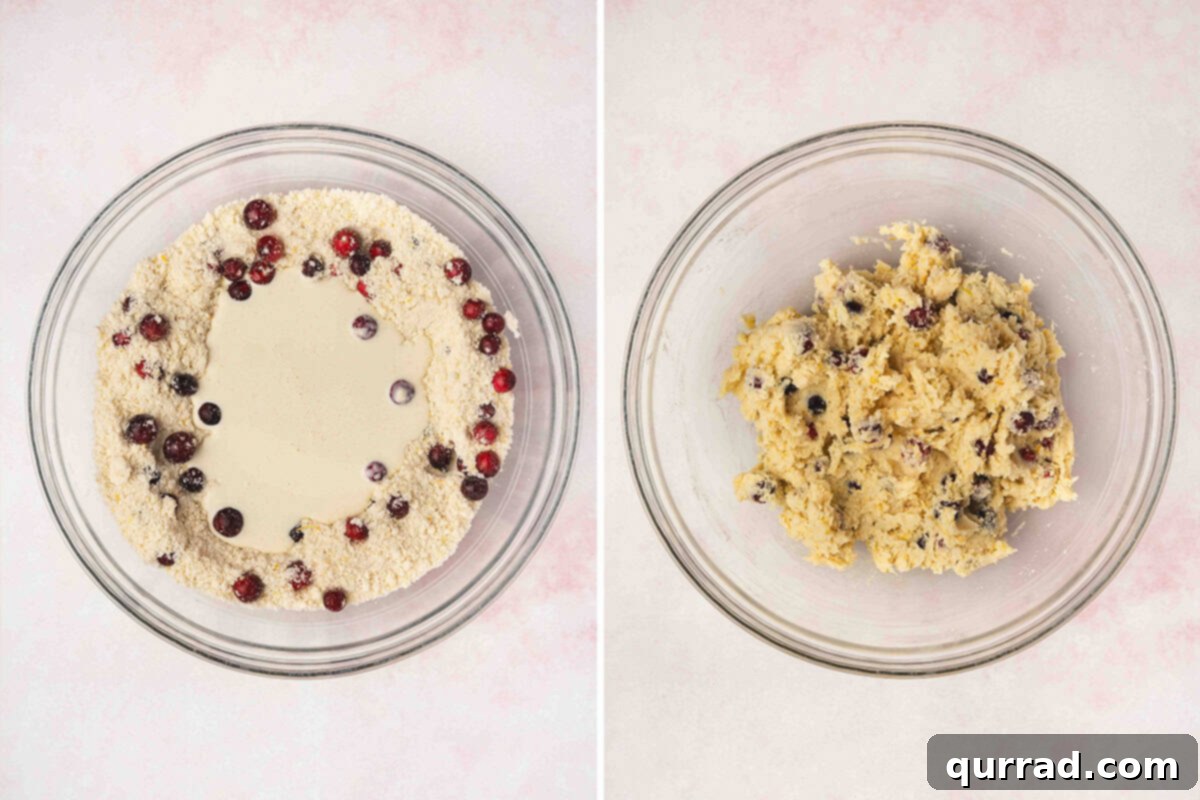 Cranberry Citrus Scones 8 Wet and dry ingredients for cranberry orange scones mixed together in bowl