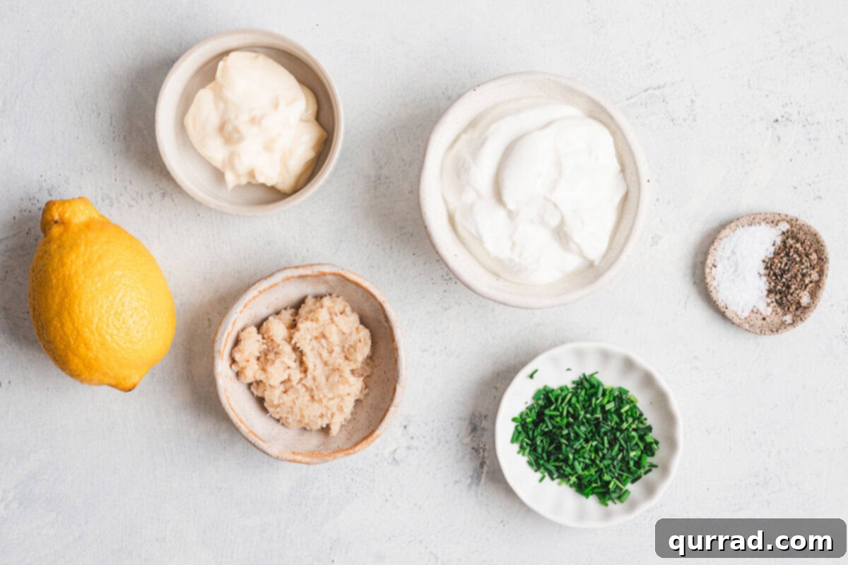 Horseradish Cream 3 Horseradish sauce ingredients laid out on a table.