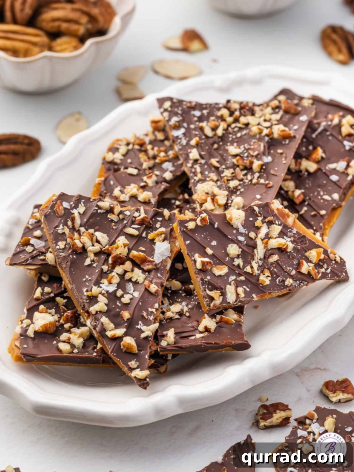 Share your homemade toffee bark with friends and family! A platter of homemade toffee bark