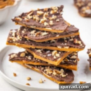 Toffee Bliss 2 A stack of toffee bark on a white plate