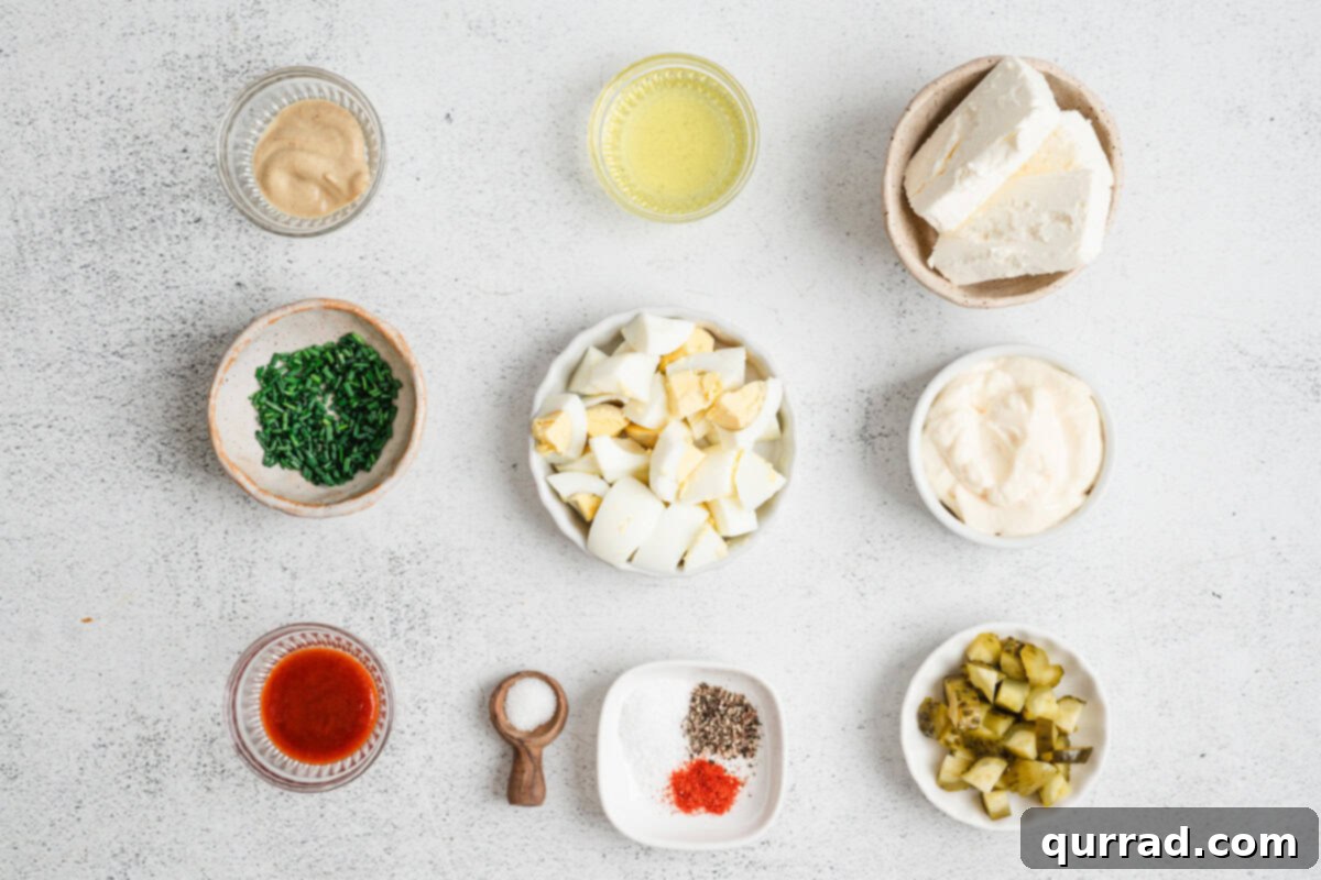 Deviled Egg Inspired Dip 4 Deviled egg dip ingredients laid out.