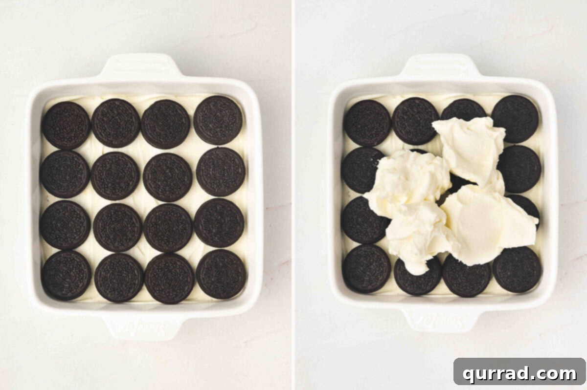 Adding another layer of dipped Oreos and mascarpone cream.