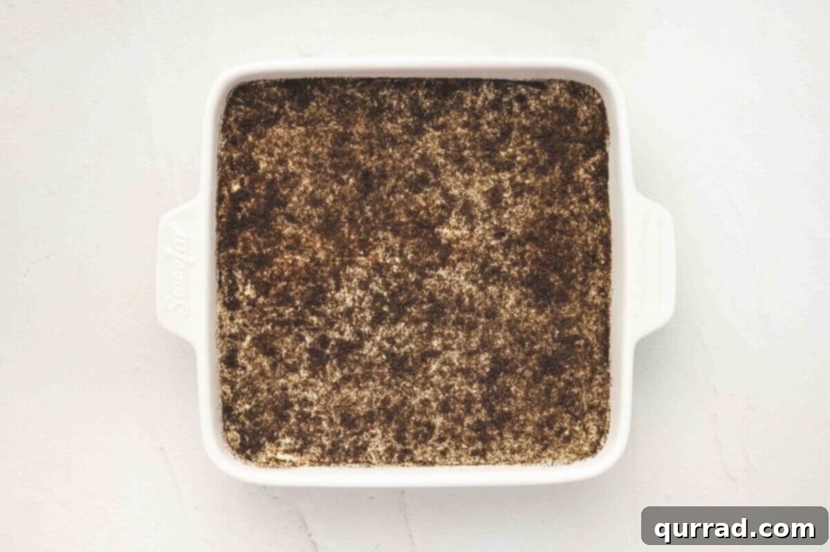 Finished Oreo Tiramisu topped with crushed Oreo crumbs.