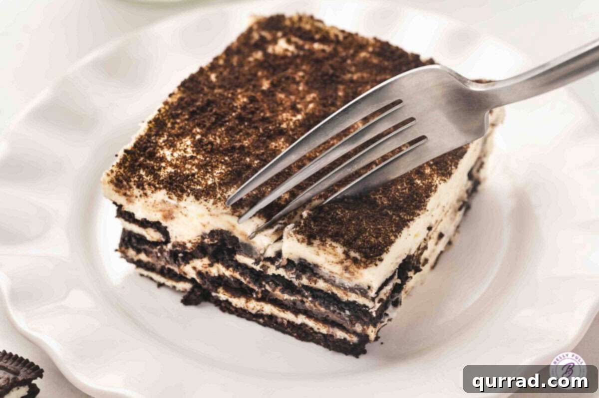 A slice of Oreo Tiramisu served on a plate.