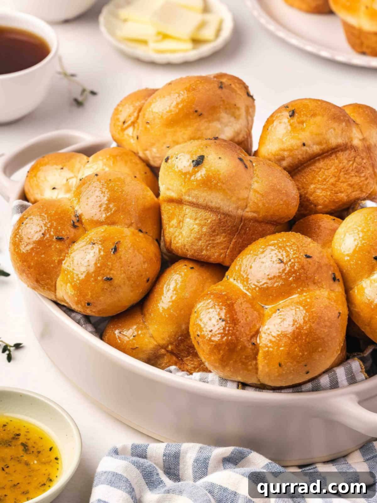 Golden Pull-Apart Buns 2 A beautiful basket of golden-brown, homemade shortcut cloverleaf rolls, perfectly baked and ready to be served.