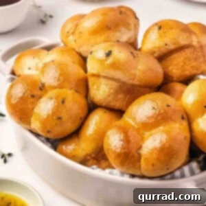 A basket of homemade shortcut cloverleaf rolls.