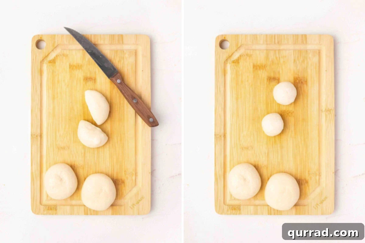 Golden Pull-Apart Buns 6 Thawed dinner rolls on a wooden cutting board; one roll is sliced in half, and another is shown re-rolled into a small, smooth ball, demonstrating the shaping process.