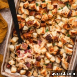 Overhead view of a finished reuben bake casserole with a spoon.