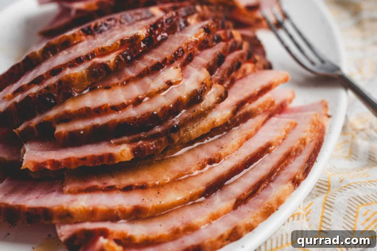 Sun-Kissed Pineapple Ham Glaze 7 Sliced ham topped with pineapple glaze.