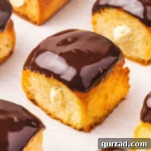 Boston Cream Pie Swirl Donuts 3 Side view of Boston Cream Pie Roll “Donuts”.