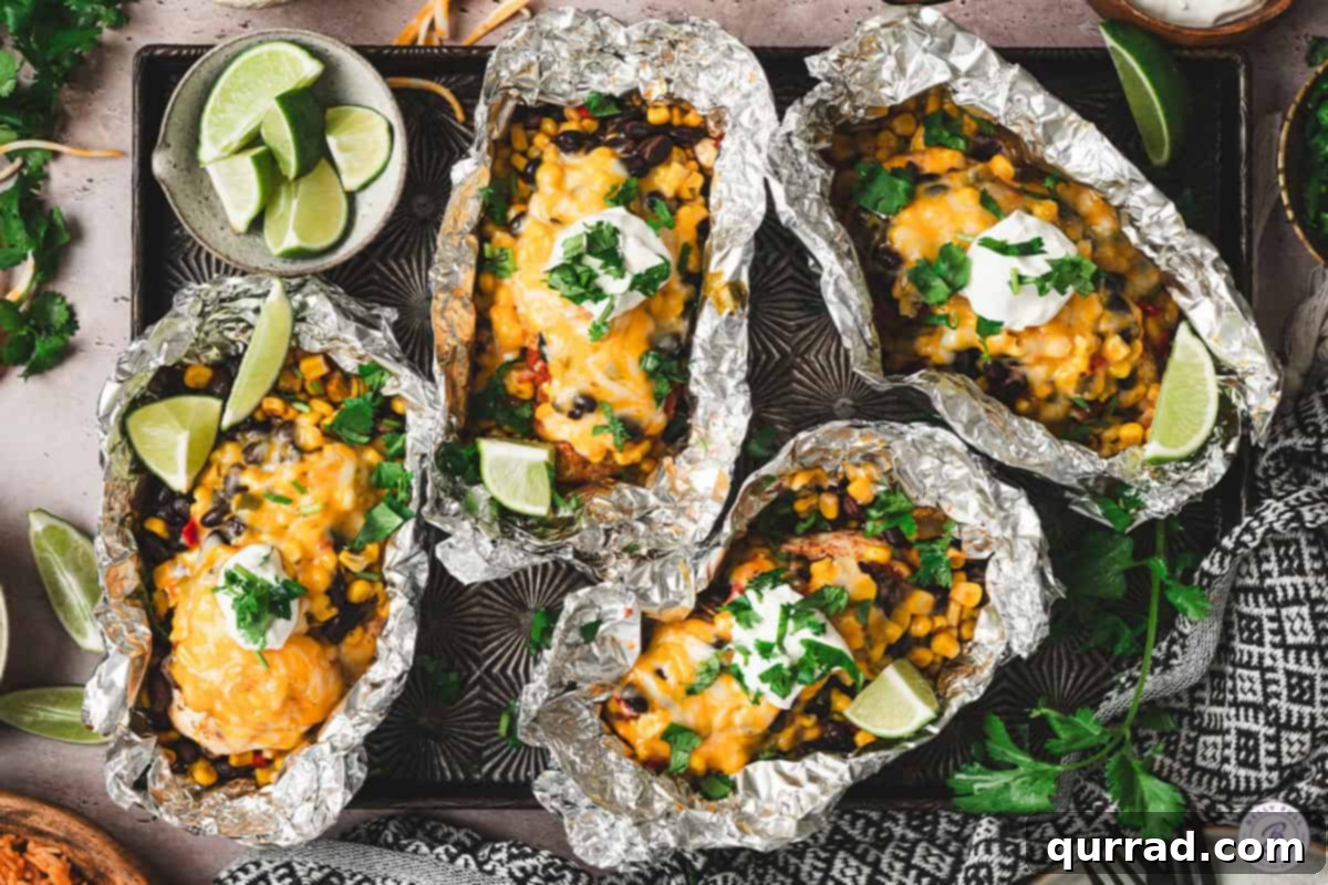 Finished Southwestern Chicken Foil Packets, garnished and ready to be enjoyed.