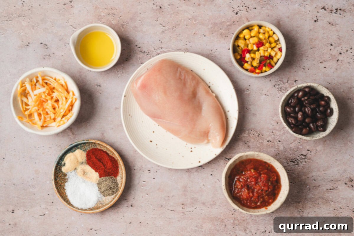 The vibrant ingredients to make Southwestern Chicken Foil Packets laid out and ready for assembly.